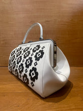 Load image into Gallery viewer, Prada white doctor bag with limited edition floral inserts.
